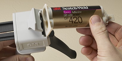 Two-part adhesives use a chemical reaction between two components to create a bond. Image of a two part adhesive.
