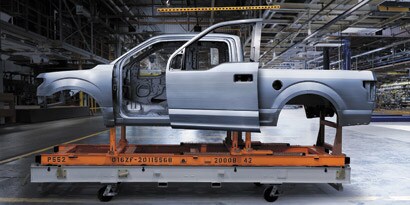 aluminum pickup truck on dolly for auto body repair
