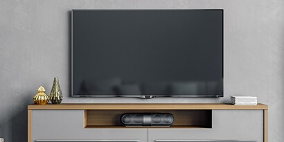 A tv on a shelf
