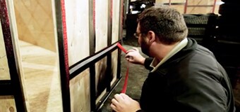 A person using a tape measure