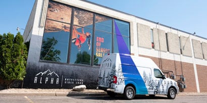 a building with a large window graphics wrap
