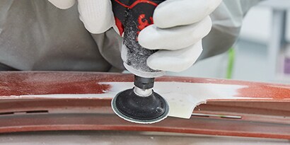 grinding bumper tab prior to auto body repair
