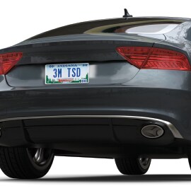 view of a sportscar from the rear, with a clear and hd license plate that reads “3M TSD