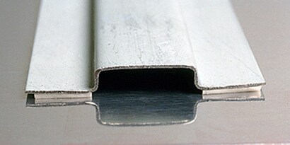 A close-up of a white metal
