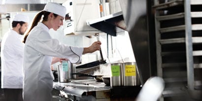 chefs working in a clean kitchen
