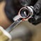 Epoxy adhesive being applied to a round object