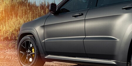 Black car with full coverage car wrap color film
