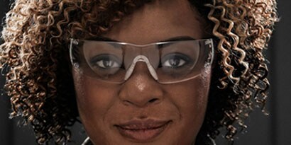 woman wearing  eye protection glasses
