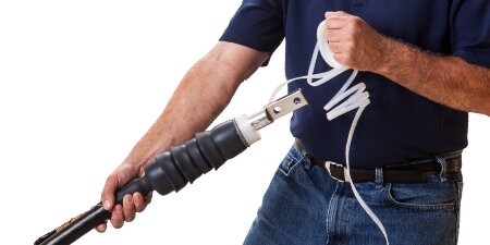 Worker using 3M Cold Shrink Terminations
