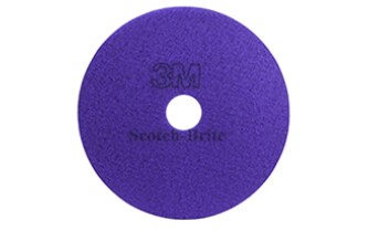 purple abrasive disc with a hole in the center