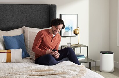Man sitting on bed
