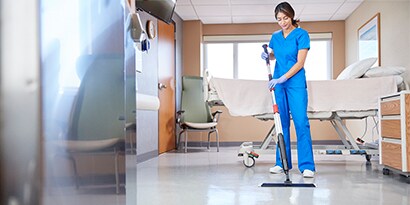 person cleaning the floor
