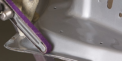 file belt sandergrinding off crimp on door skin
