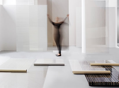person in a room with a few mats
