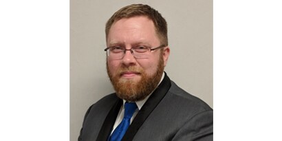 person in a suit and tie

