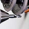 Diamond grinding wheel fluting a cutting tool