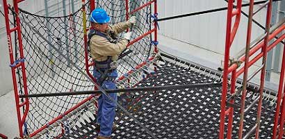 Fall protection trainer in fall protection training facility
