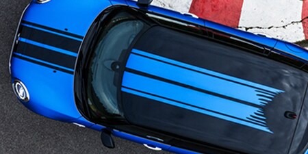 Blue car with partial coverage car wrap color film, affordable car wrap price
