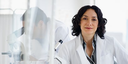 Professional woman smiling at work
