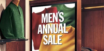 View of a promotional sign and display for a men's annual sale
